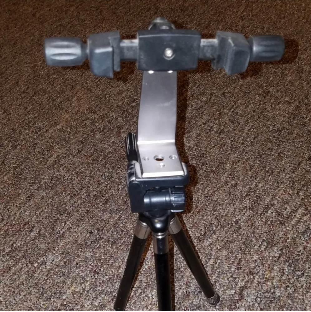 Tripod with phone adapter holster